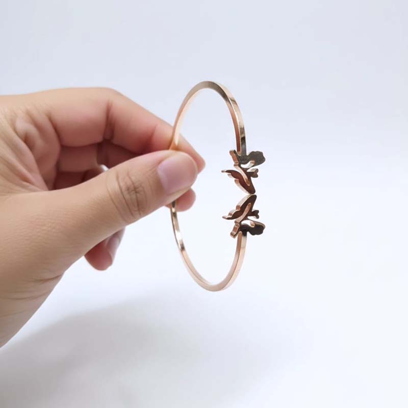 Elegant Open-Ended Gold-Tone Bypass Bracelet - Image 2