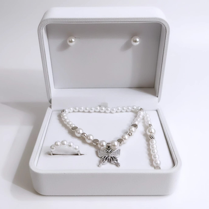 Simple. Elegant. Timeless. Pearl butterfly jewellery set - Image 2
