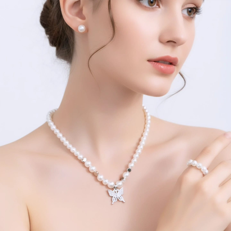 Simple. Elegant. Timeless. Pearl butterfly jewellery set - Image 4