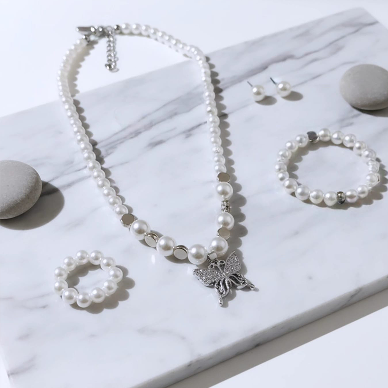 Simple. Elegant. Timeless. Pearl butterfly jewellery set - Image 3