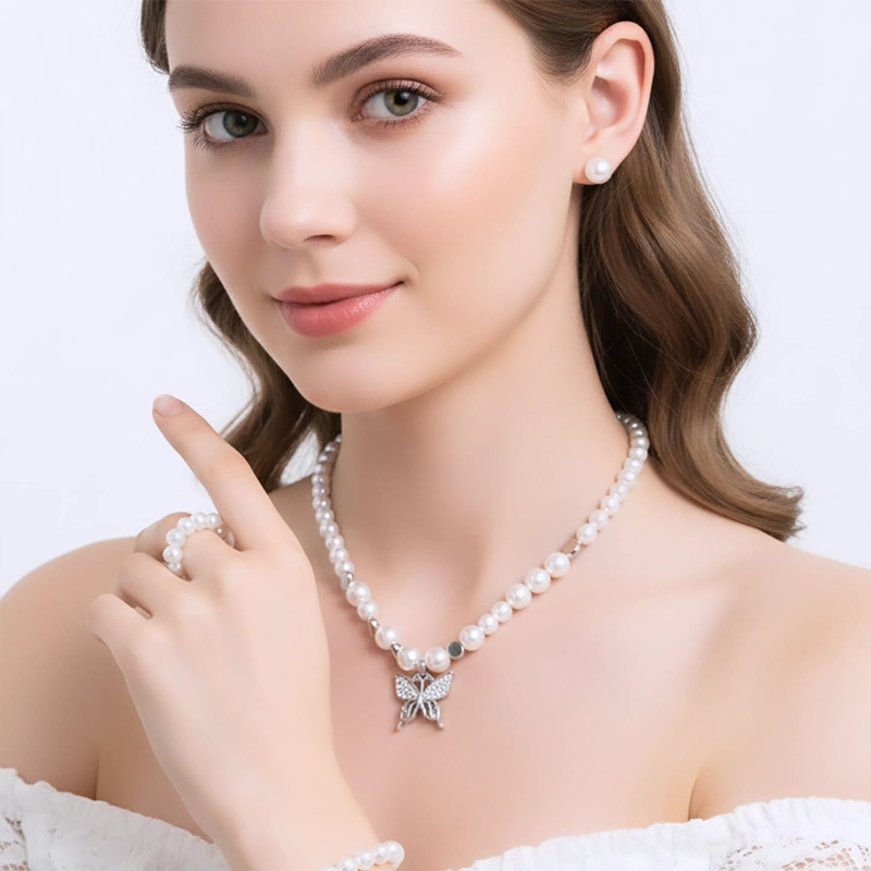 Simple. Elegant. Timeless. Pearl butterfly jewellery set - Image 6