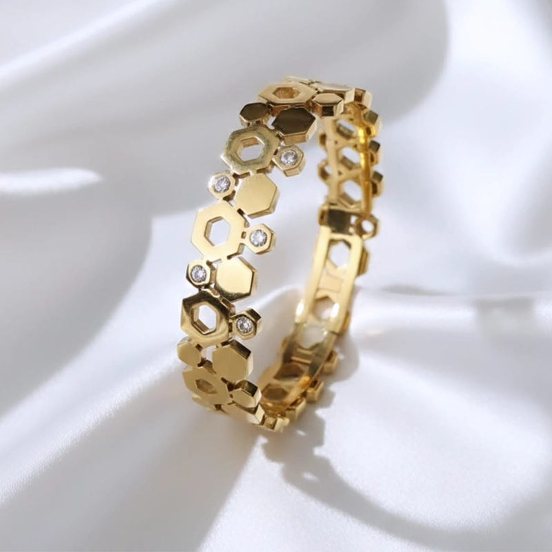 Radiant solid gold plates, open-frame cutouts, diamond-set accents design anti tarnish bracelet