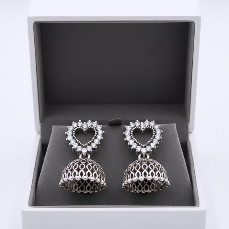 Stunning heart-shaped stud, beautifully outlined with small, shimmering stones Jhumka earrings