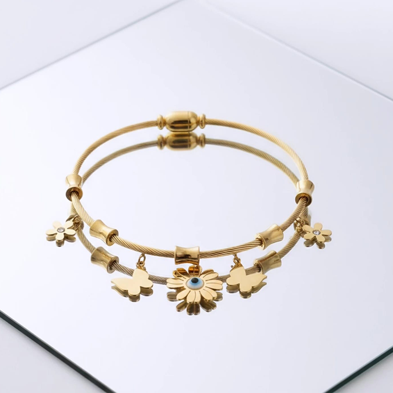 Stunning twisted cable wire,Butterflies,Flowers, Evil Eye design anti tarnish bracelet - Image 2