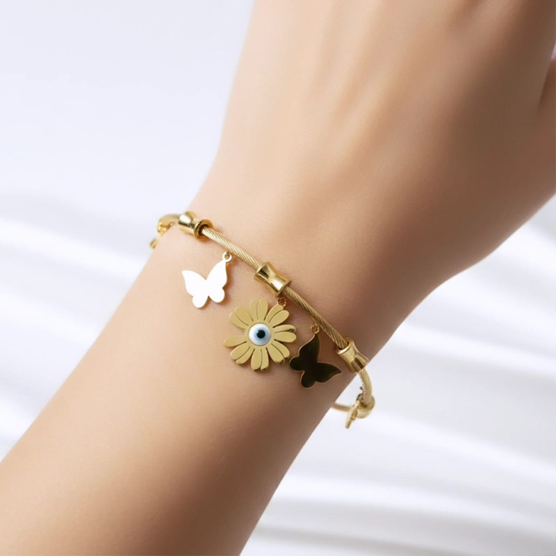 Stunning twisted cable wire,Butterflies,Flowers, Evil Eye design anti tarnish bracelet - Image 6