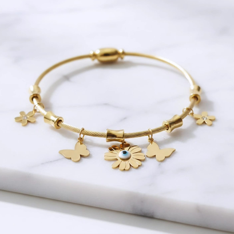 Stunning twisted cable wire,Butterflies,Flowers, Evil Eye design anti tarnish bracelet - Image 3