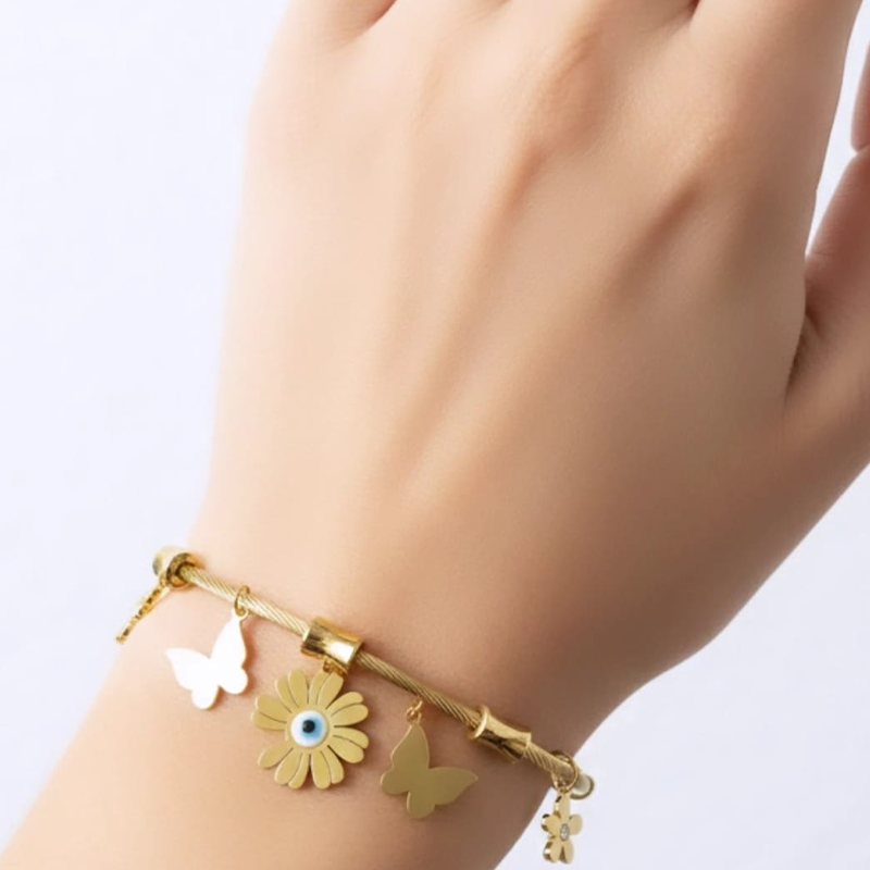 Stunning twisted cable wire,Butterflies,Flowers, Evil Eye design anti tarnish bracelet - Image 8