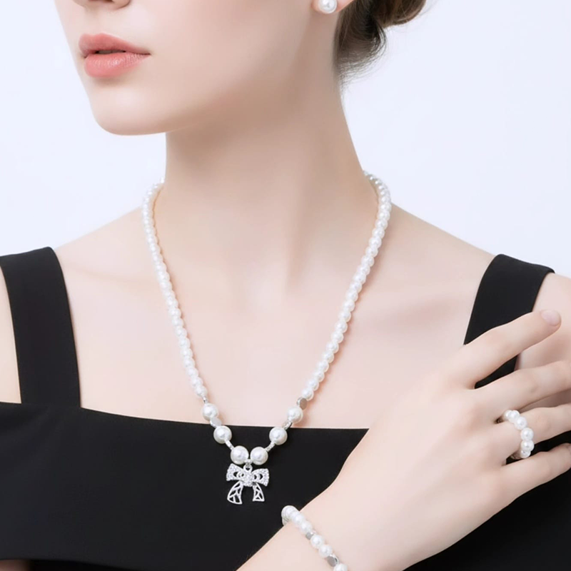 Classy white round pearls,silver-toned bow charm pearl jewellery set - Image 7