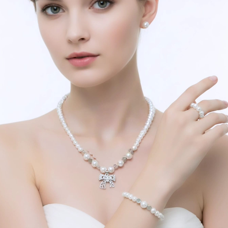 Classy white round pearls,silver-toned bow charm pearl jewellery set - Image 5