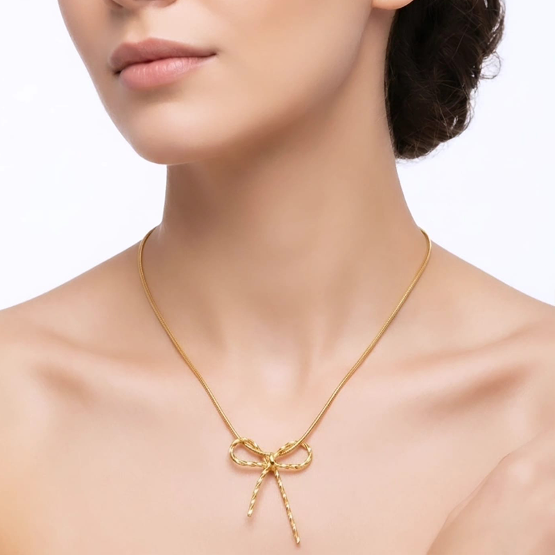 Luxurious bow shape, gold-toned pendant - Image 7
