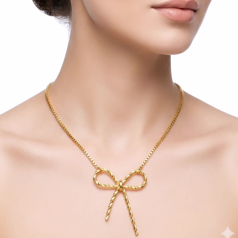 Luxurious bow shape, gold-toned pendant - Image 9