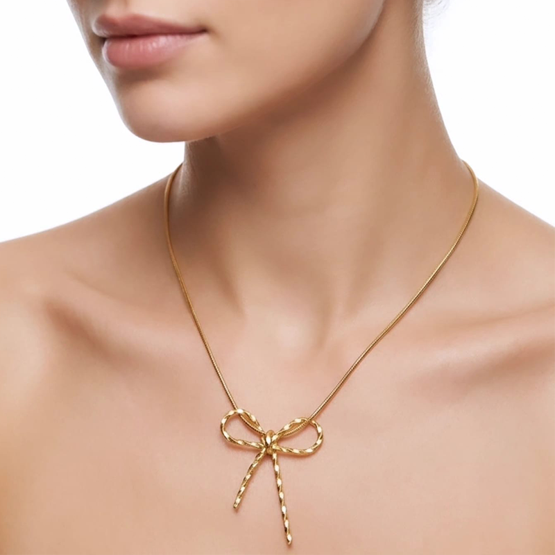Luxurious bow shape, gold-toned pendant - Image 8