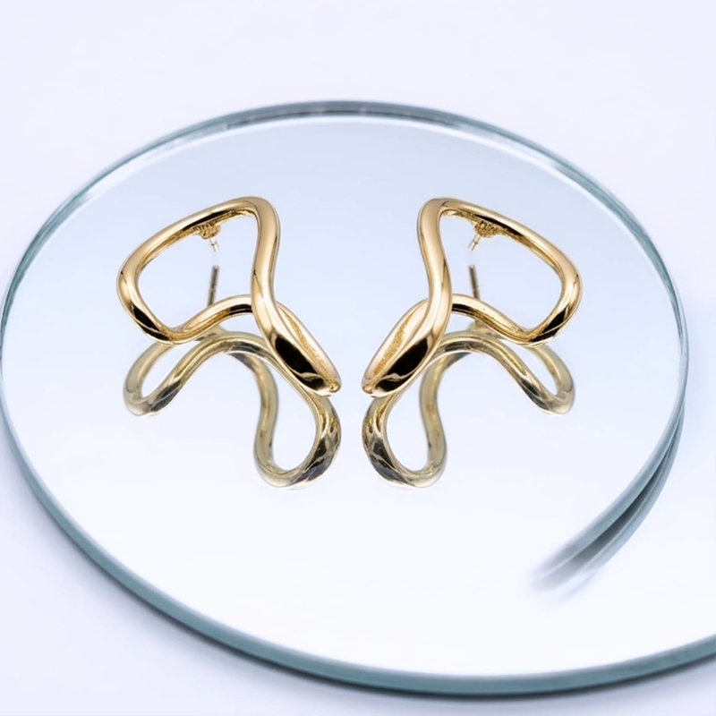 Beautiful modern, sculptural design, high-shine gold finish earrings - Image 3