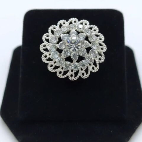 Circular piece lacy, floral,star-like design ring