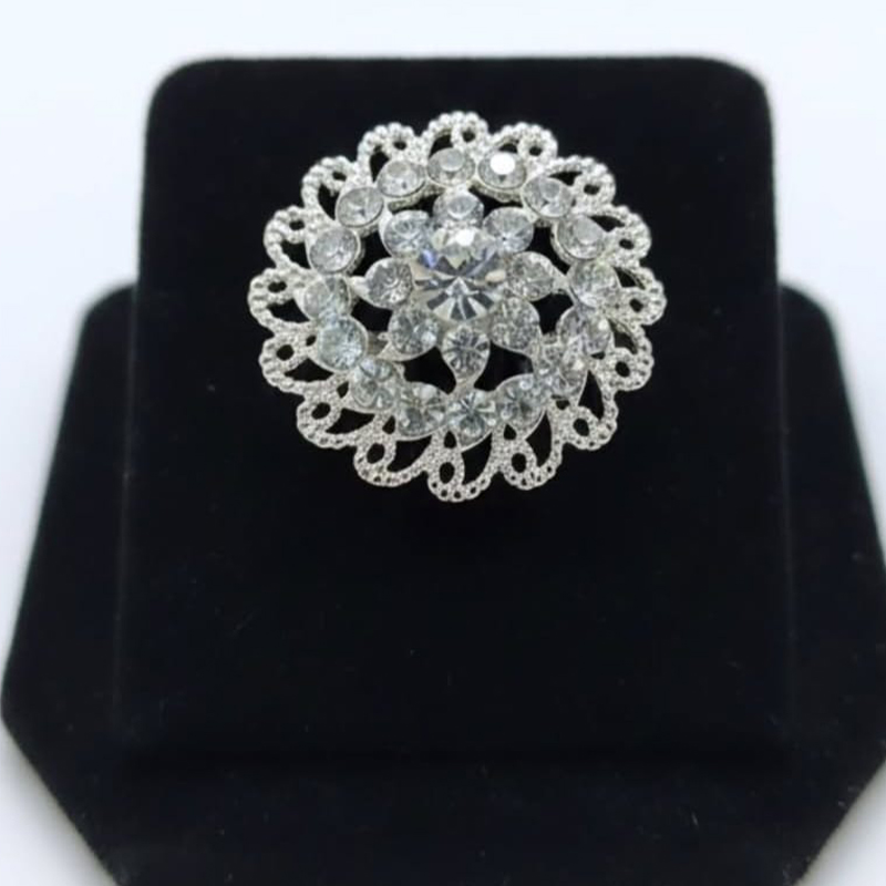 Circular piece lacy, floral,star-like design ring