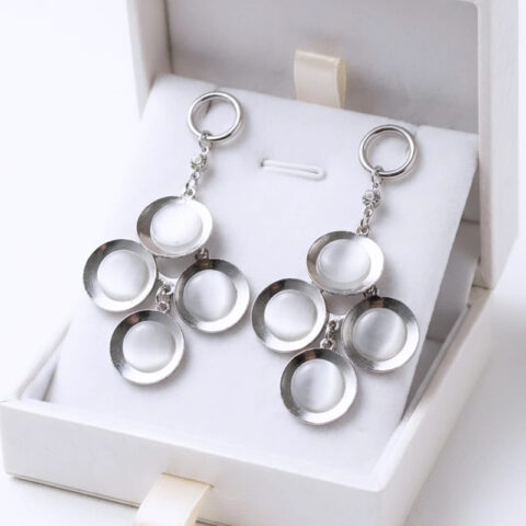 Divine contemporary, chandelier-style drop ,white cabochon earrings